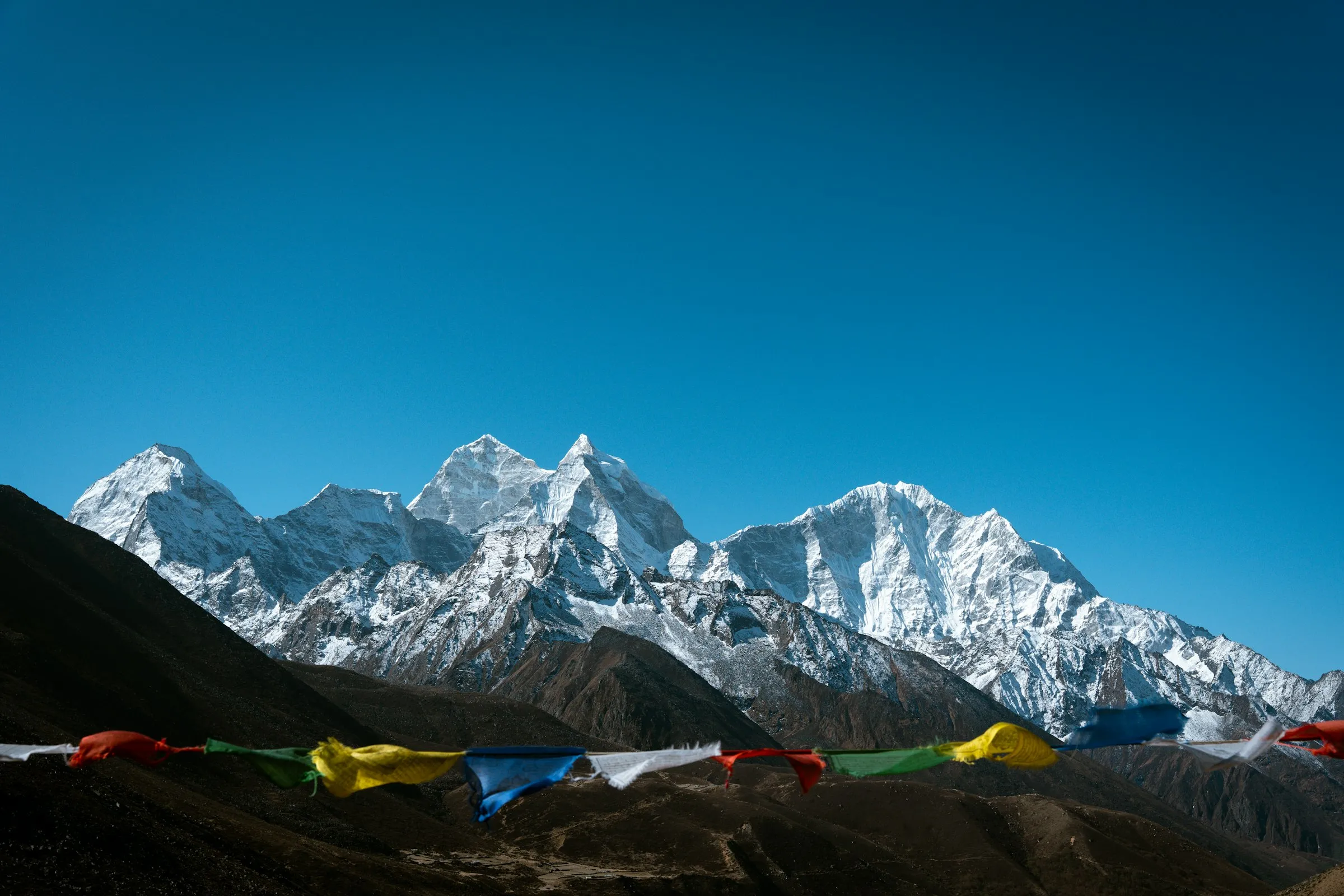 Prayer flags in the Khumbu with Kangtega and Thamserku